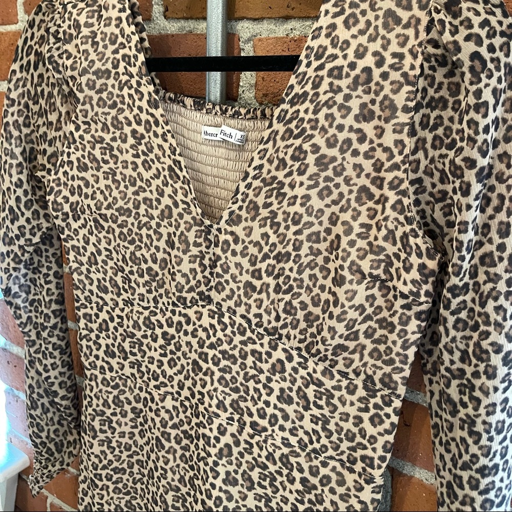 Cheetah print cinched waistline dress. Like new